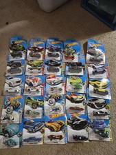 Mattel Hotwheels Lot Of 25 Cars , Movie Cars, Chevy, Ford Etc New On Card