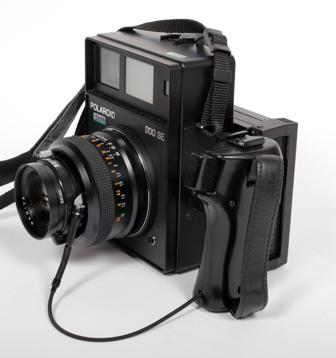 Polaroid 600 SE camera with 127mm F4.7 lens + back #5898 | eBay