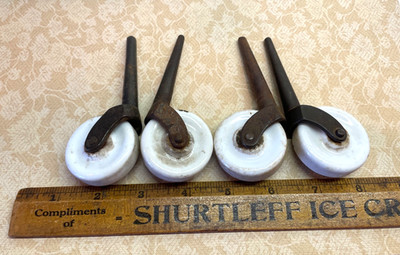 Porcelain Wheel Stem Casters White wheel: 1 11/16'' dia.; height: 4'' Set of 4