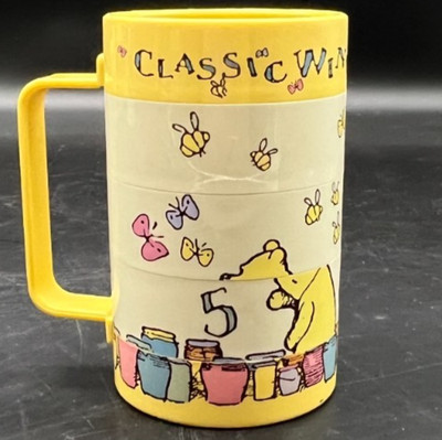 Disney Classic Plastic Winnie The Pooh Swivel Kid's Mug-Yellow