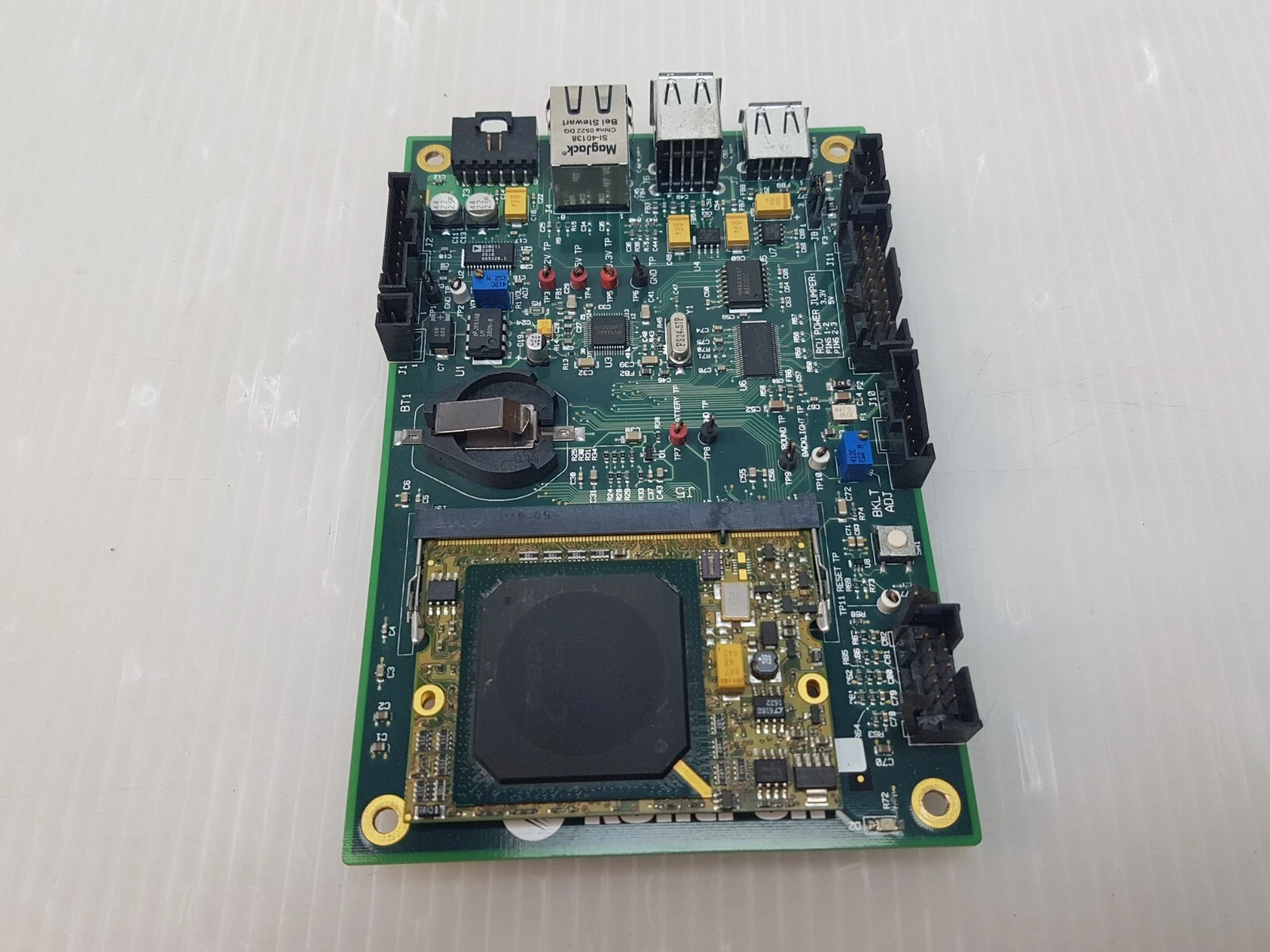 Kontron 700-176 board seen from the I/O end with USB ports and RJ45 jack
