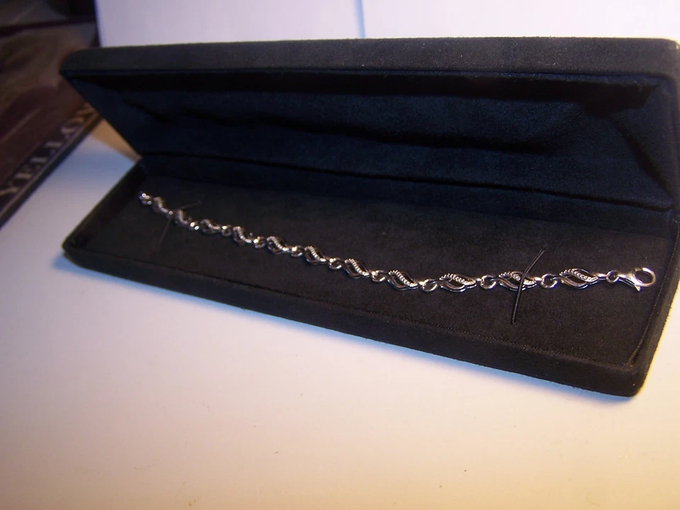 PULSERA TENIS ZALES JEWELERS PLATA ESTERLINA DIAMANTE DISEÑO LLAMA 7 1/2" Foto 2 de 4