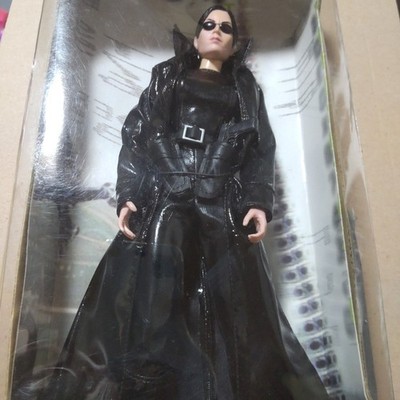 Matrix. Trinity. Real figure. Enamel outfit. Equipped with gun.