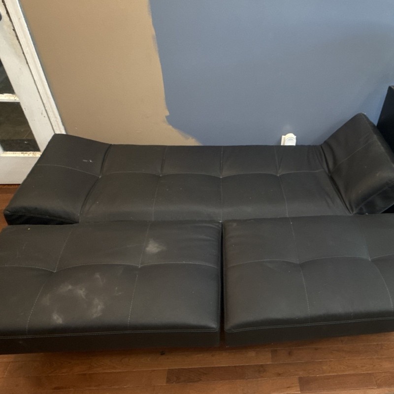 Black Faux Leather Convertible Tufted Futon Sofa Bed, 66x40x36 in, Used