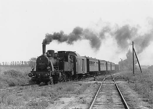 Foto DR 91.1941 mit Personenzug in Putlitz 1968