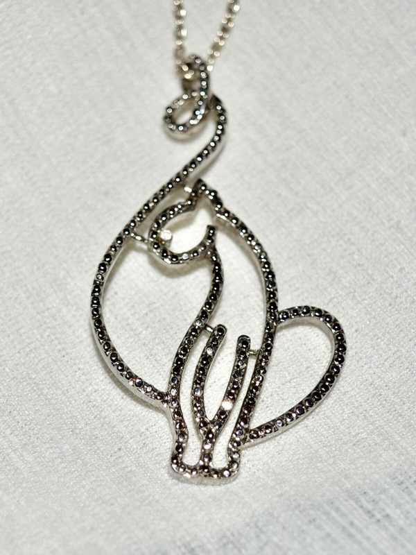 cat outline pendant silver color
