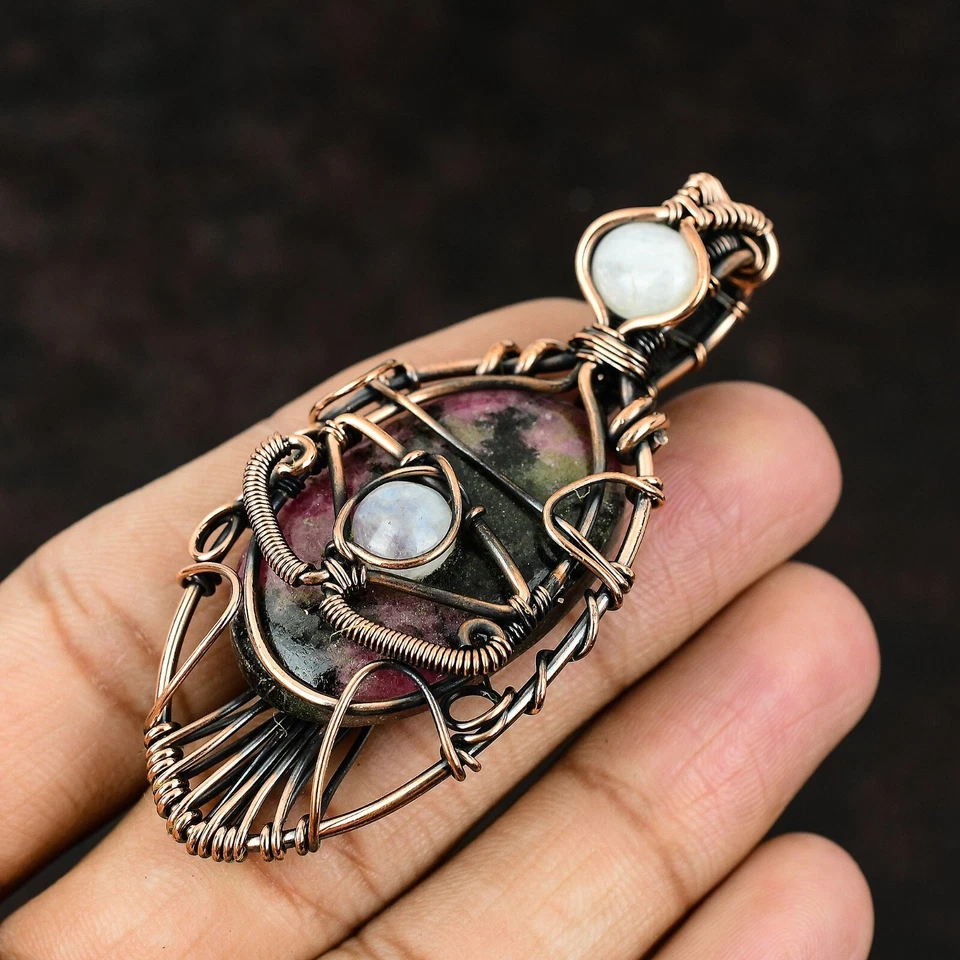 Colgante madre mal de ojo envuelto en alambre de piedra lunar arco iris rodonita natural de cobre Foto 4 de 4