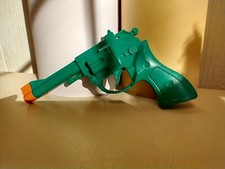 Vintage Green Plastic Comb Shaped Like Cowboy Gun Trigger Clicks 1/11/24.