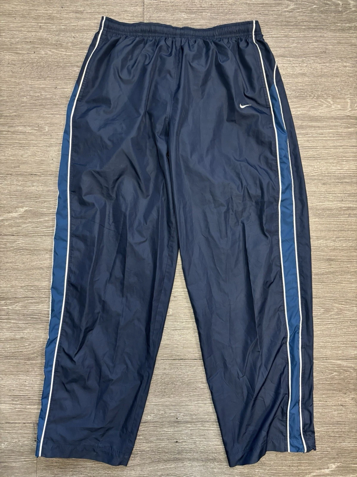 Vintage Nike Navy Blue Striped Track Pants From The 2000s Era Size XLarge