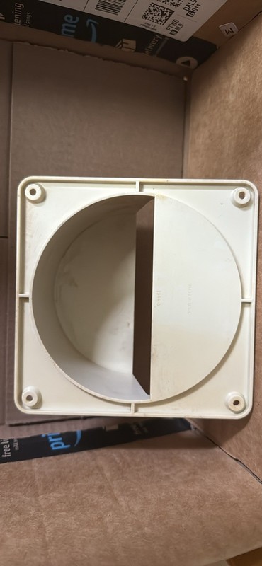 Vintage Tupperware wall mounted lids or paper plate holders. 