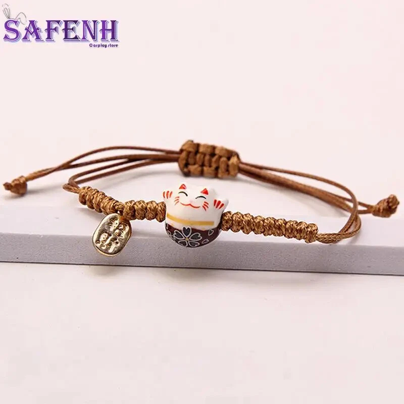 Brazalete de cuerda tejido a mano simple de cerámica para gato de la suerte tejido a mano colores rojos Foto 4 de 4