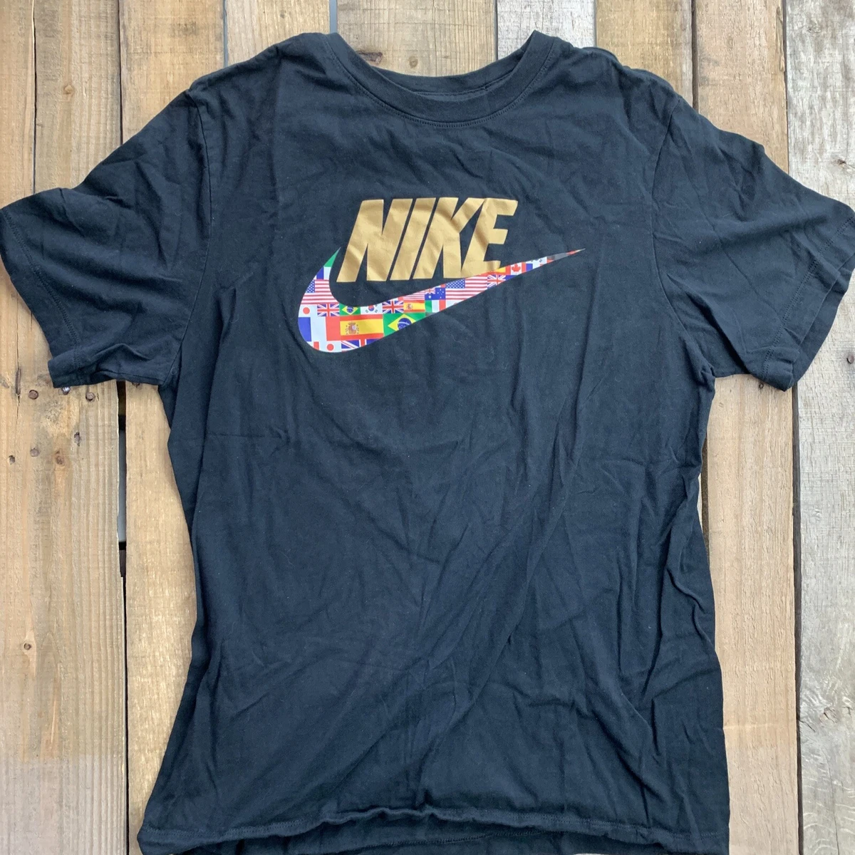 Black and gold hotsell mens nike shirt