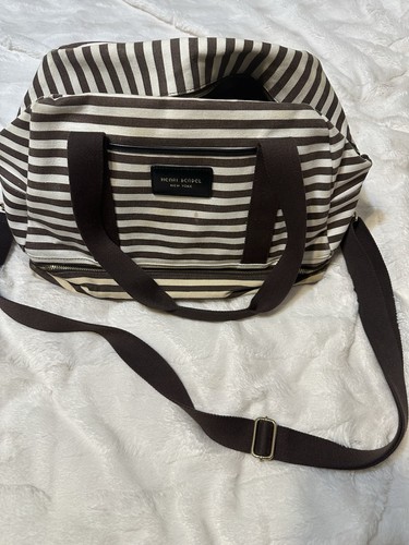 Henri Bendel Brown stripe weekender bag with gold tone hardware that is preowned