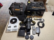 Nikon D90 12.3MP Digital SLR Camera w/ VR 18-105mm Lens With Case