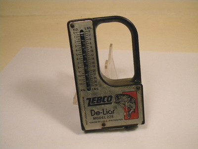 Vintage Zebco De-Liar Model 228 Scale & Tape Measure bass