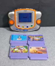 Vtech V.Smile Pocketlearning System w/ 4 Game Cartridges
