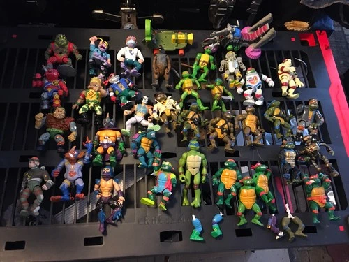 Lot of 35 Vintage Teenage Mutant Ninja Turtles Figures plus "ANGUS " +2 VEHICLES