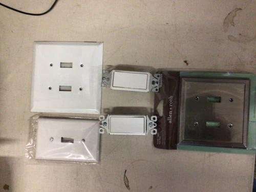1 mixed lot of electrical switches and covers. Used