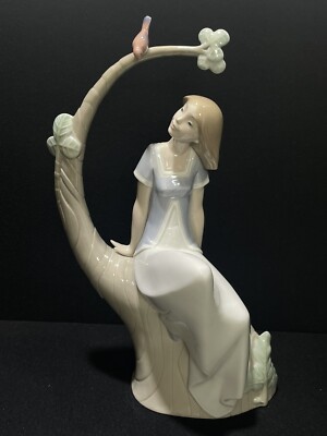 NAO by Lladro 1523 A Lazy Afternoon Woman Sitting on Tree