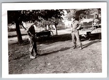 Vtg B W Snapshot Two Soldiers in Uniform By Military Truck Farm Field 1940s