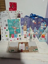 pack of 7 holiday gift bags with 10 sheet tissue small to medium various sizes