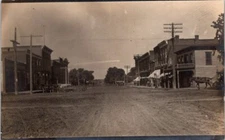 RPPC Postcard Businesses and Horse Carriages on Dirt Street c.1904-1918    12638