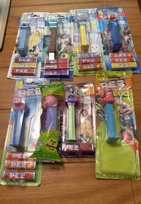 LOT OF 8 PEZ CANDY DISPENSERS NEW IN ORIGINAL PACKAGE