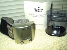 sharper image digital wrist blood pressure monitor w/ case  me 803 silver gray