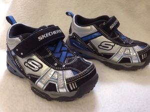 black and silver skechers