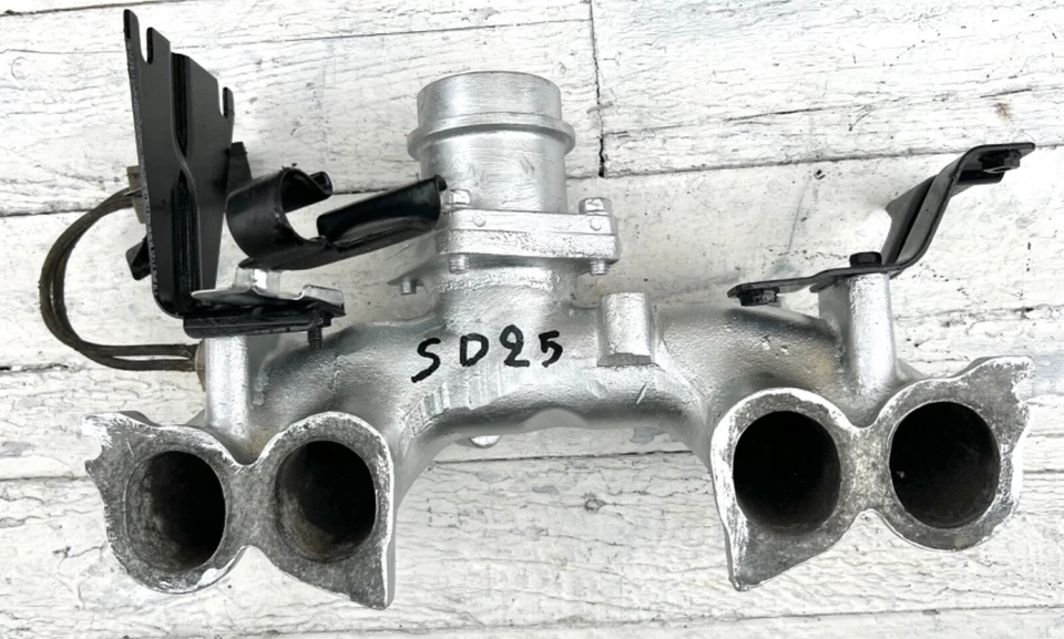 Colector de admisión 4x4 motor Nissan Datsun 720 D21 P/U UTE SD25 2,5cc 8 V USADO  Foto 2 de 4