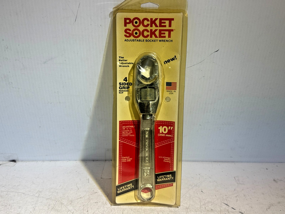 NOS (New Old Stock) 10-inch adjustable wrench that folds down to pocket size — a genuinely clever piece of vintage tool engineering that still works perfectly out of the box.