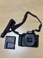 Canon EOS Rebel T100 18 MP Digital SLR Camera - Black