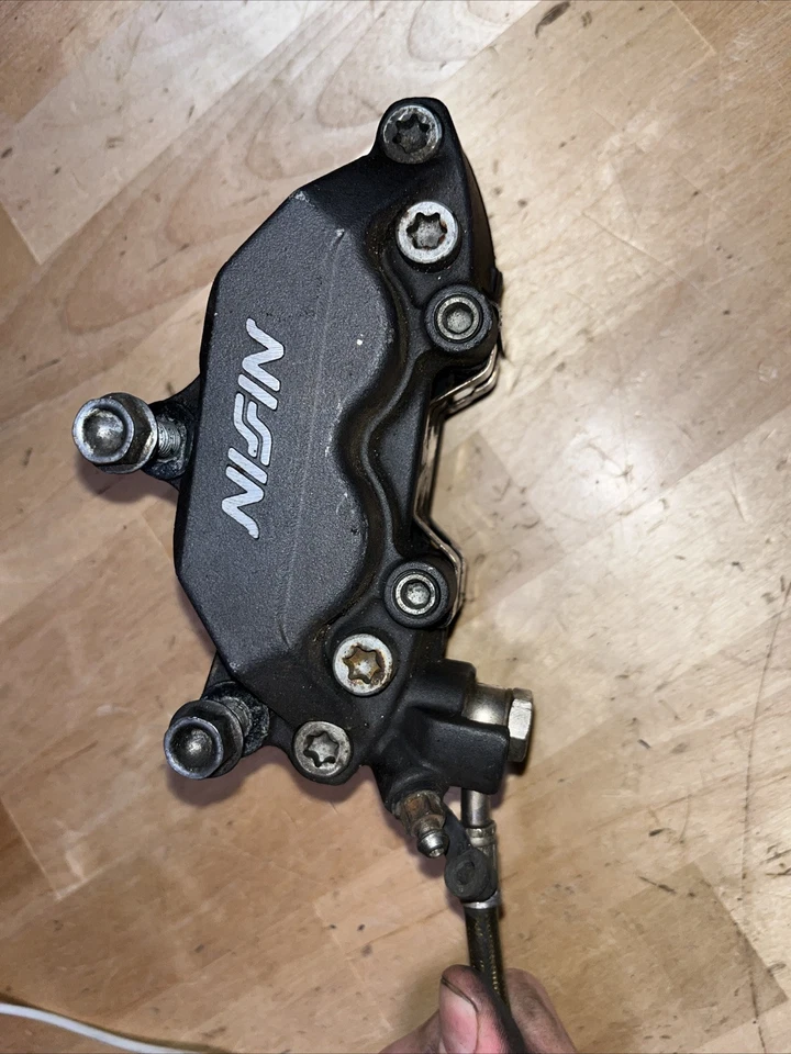 Pinza de freno delantera derecha Honda 2001-2006 CBR600F4i CBR600 F4i OEM NISIN * Foto 3 de 4