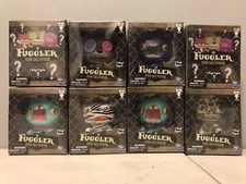 Fuggler Funny Ugly Monster Vinyl Figure Lot of Eight Figures.