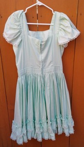 green and white lace dress