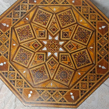 This is a vintage octagonal marquetry inlaid side table or accent stand