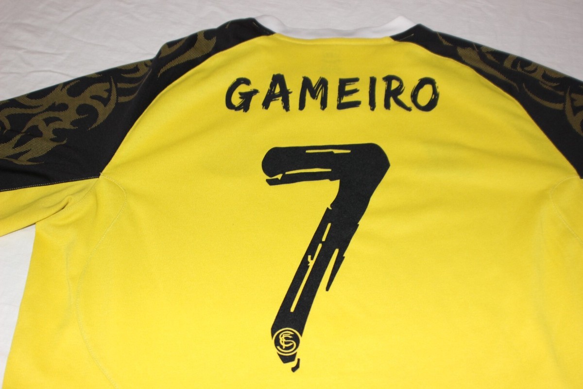 CAMISETA OFICIAL VINTAGE SEVILLA FC DE MARCA WARRIOR TALLA L DORSAL 7 GAMEIRO
