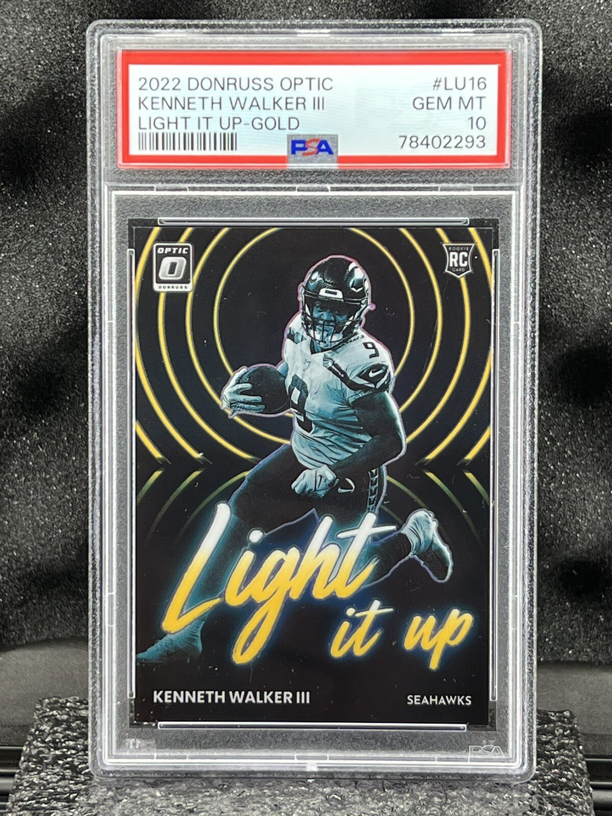 Kenneth Walker III Panini Donruss Optic Light It Up #LU16 Gold