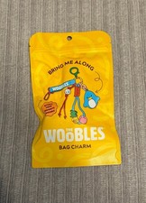 The Woobles Pop-up Store Exclusive Bag Charm featuring Pierre the Penguin