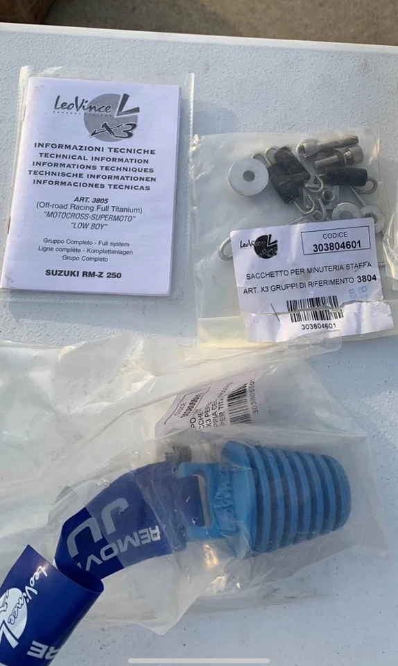 Sistemas de escape Leo Vince X3 SUZUKI RM-Z 250 titanio completo “LOW BOY” Foto 4 de 4