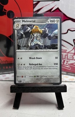 Pokémon TCG Stellar Crown Melmetal 104/142 Cosmos Holo Blister Exclusive 