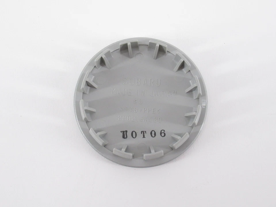 Tapacubos central de rueda genuino OEM Subaru 28821SA030 (1) Foto 3 de 3