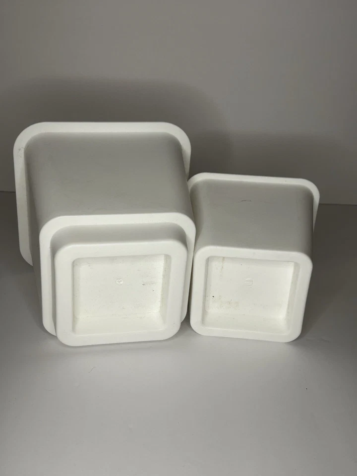 Juego de 8 elevadores de cama de plástico blanco Target para muebles de dormitorio de alta resistencia Foto 4 de 4