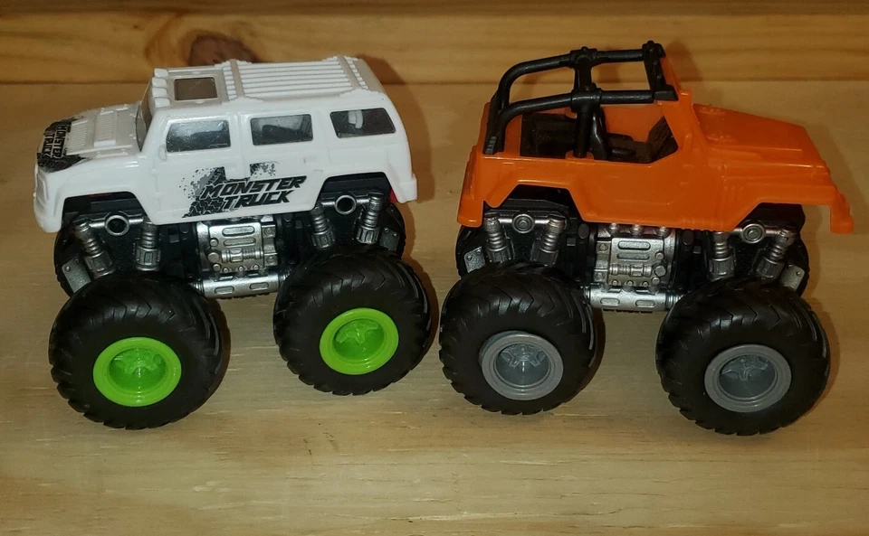 2 juguetes Monster Truck tapas intercambiables acción de empuje rodante 4,5" x 4,5" Foto 2 de 4