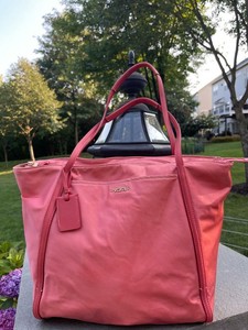 tumi pink tote