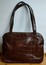 Las mejores ofertas en Bolsos y carteras Relic animal print para