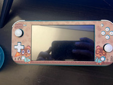 Nintendo Animal Crossing themed  Switch Lite￼turquoise