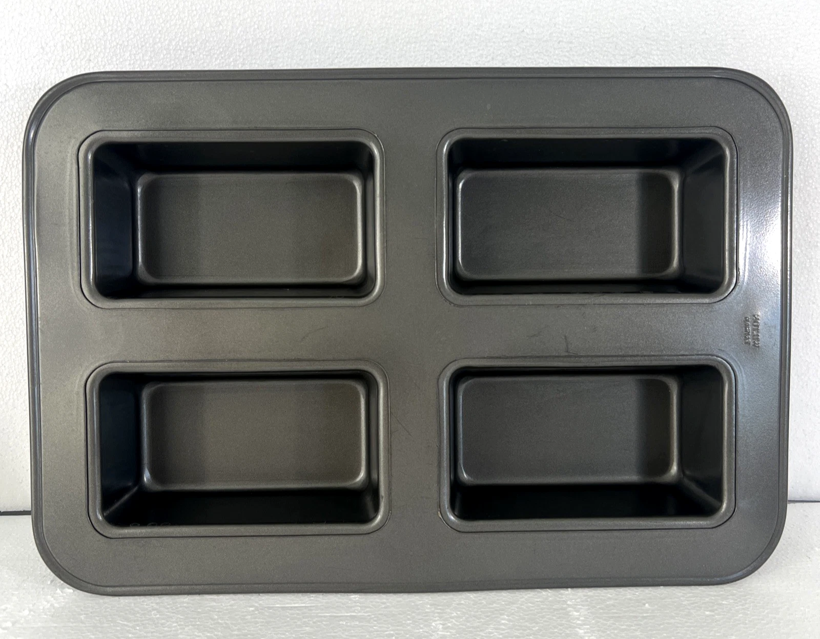 Wilton Indulgence Four (4) Cavity Mini Loaf Pan Heavy Duty Steel Non-Stick 15.5"
Opens in a new wind