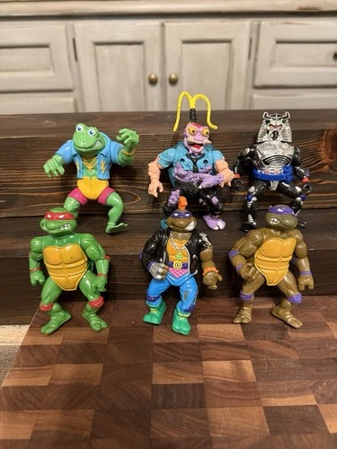 Vintage Teenage Mutant Ninja Turtles action figure lot – 6 total figures.