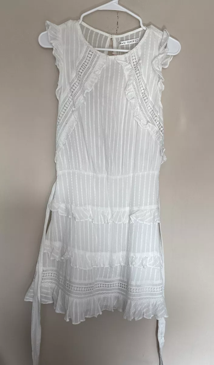 Saints and top secrets white dress